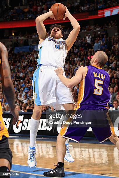 Danilo Gallinari of the Denver Nuggets takes a shot over Steve Blake of the Los Angeles Lakers in Game Four of the Western Conference Quarterfinals...