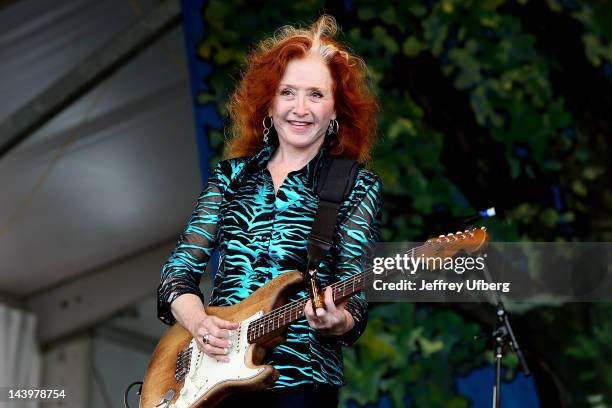Singer/musician Bonnie Raitt performs with the Preservation Hall Jazz Band during the 2012 New Orleans Jazz & Heritage Festival at the Fair Grounds...