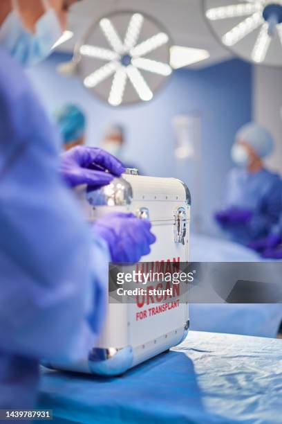 organ grinder - transplant surgery stock-fotos und bilder