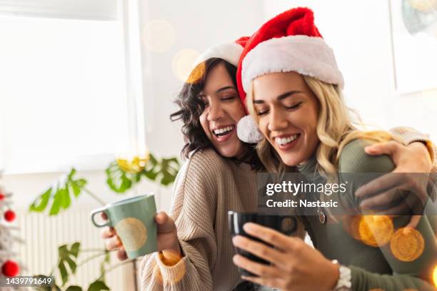 christmas holiday coffee with best friend - gay santa claus stock pictures, royalty-free photos & images