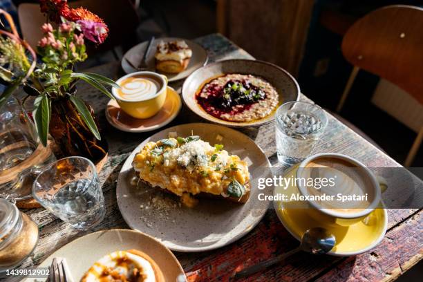 healthy breakfast served in a cafe, side view - brunch stock pictures, royalty-free photos & images