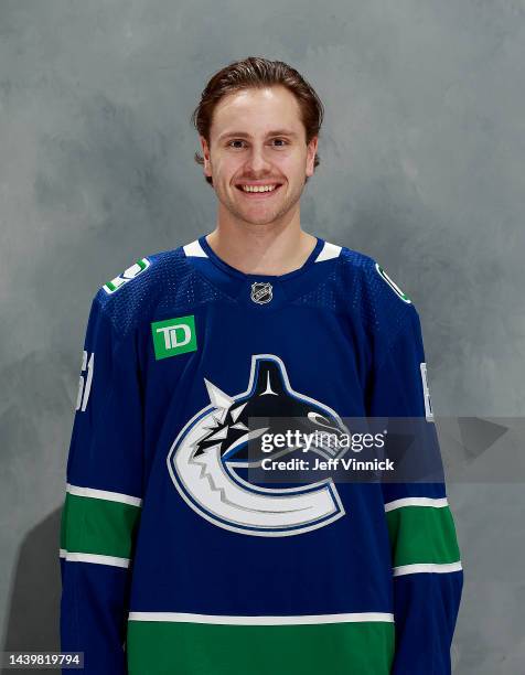 Riley Stillman of the Vancouver Canucks poses for his official headshot for the 2022-2023 season before their NHL game against the Nashville...