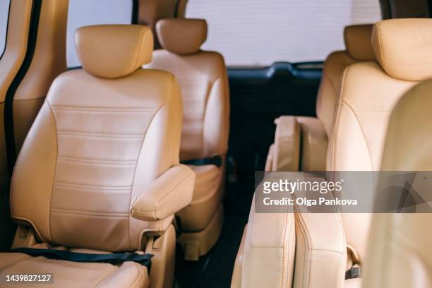 interior of minivan car - vehicle seat foto e immagini stock