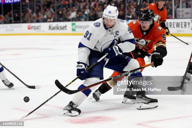Steven Stamkos of the Tampa Bay Lightning controls the puck against Jamie Drysdale of the Anaheim Ducks during the third period of a game at Honda...
