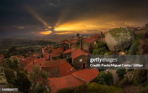 high angle view of townscape against sky during sunset,monsanto,portugal - monsanto stock pictures, royalty-free photos & images