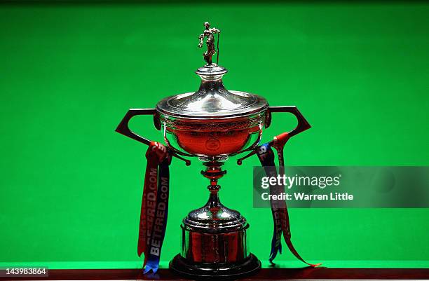 The trophy is pictured ahead of the final of the Betfred.com World Snooker Championship between Ronnie O'Sullivan and Allister Carter of England at...