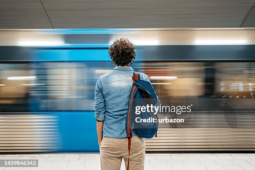 Young Man Waiting For A Subway Train In Stockholm Young Man Waiting For A Subway Train In Stockholm