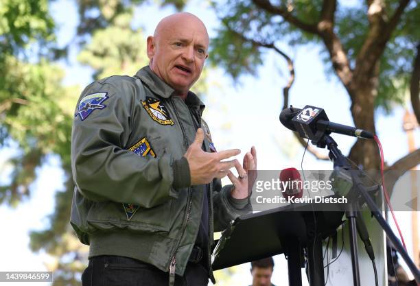 Sen. Mark Kelly speaks at a press conference outside the Arizona State Capitol on November 07, 2022 in Phoenix, Arizona. Jack McCain, son of the late...