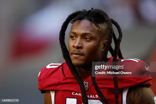 DeAndre Hopkins of the Arizona Cardinals looks on as he takes the field prior to an NFL Football game between the Arizona Cardinals and the Seattle...