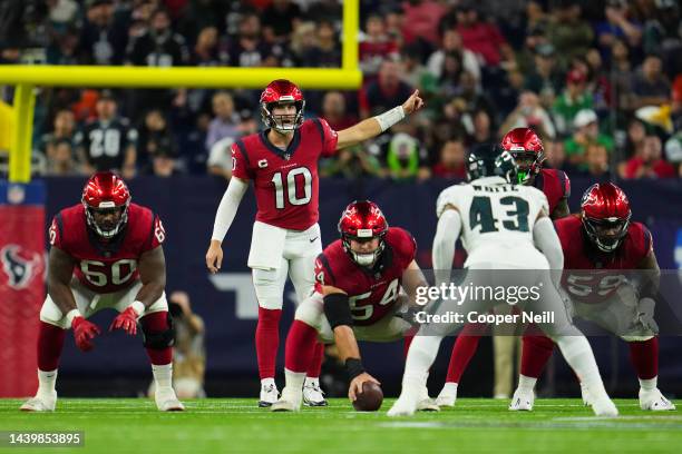 Davis Mills of the Houston Texans signals against the Philadelphia Eagles at NRG Stadium on November 3, 2022 in Houston, Texas.