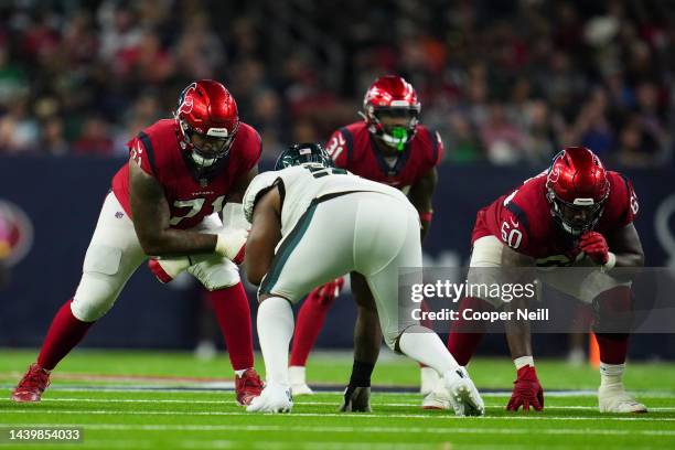 Tytus Howard of the Houston Texans and A.J. Cann get set against the Philadelphia Eagles at NRG Stadium on November 3, 2022 in Houston, Texas.