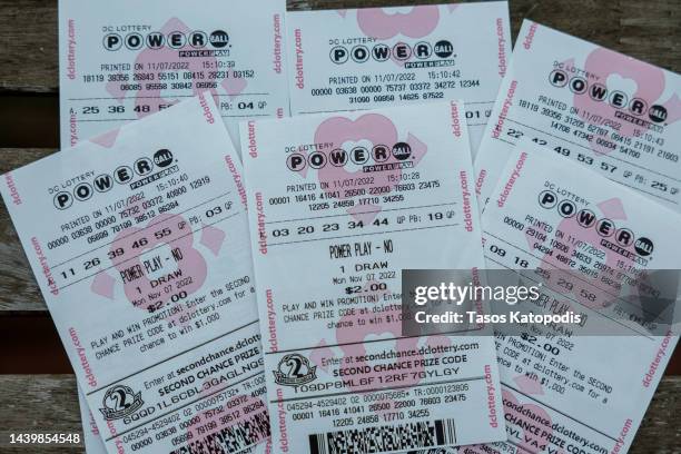 In this photo illustration, tickets for the upcoming Powerball lottery are seen on November 07, 2022 in Washington, DC. The estimated Powerball...