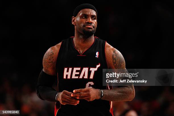 LeBron James of the Miami Heat looks on against the New York Knicks in Game Four of the Eastern Conference Quarterfinals in the 2012 NBA Playoffs on...
