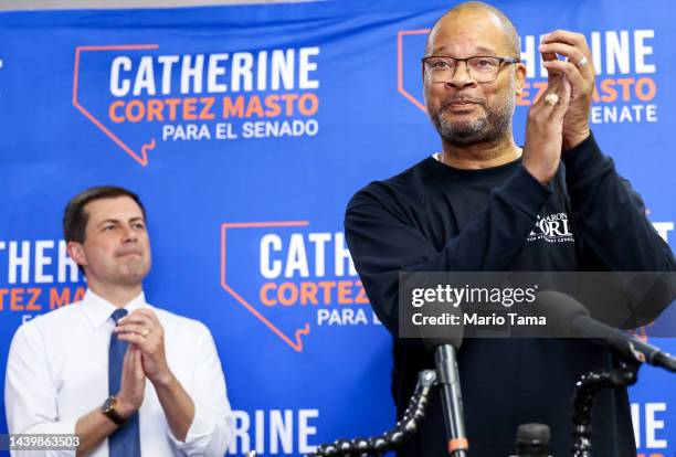 Transportation Secretary Pete Buttigieg looks on as Nevada Attorney General Aaron D. Ford speaks at a canvass kickoff event in support of Sen....