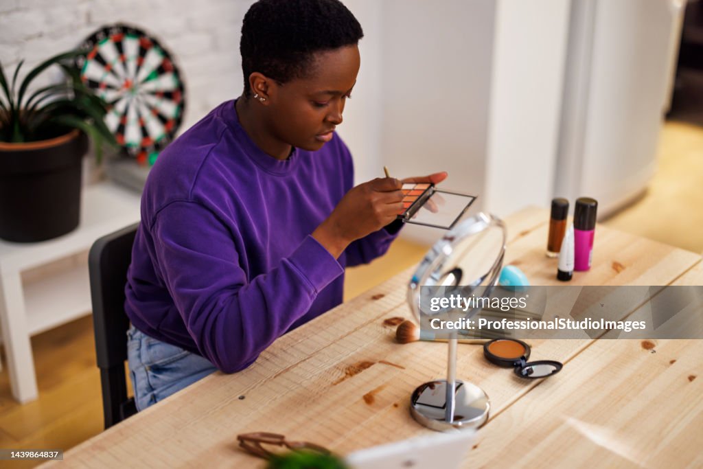 African Girl Routine An African Woman Is Doing Her Morning Routine And Applying Mascara On ...