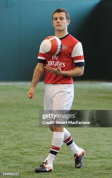 Jack Wilshere poses during a photoshoot for the new Arsenal home kit for season 2012/13 at London Colney on April 5, 2012 in St Albans, England.