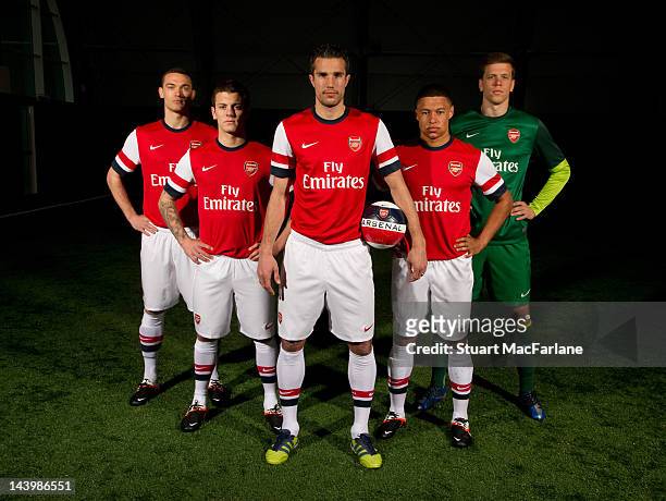 Thomas Vermaelen, Jack Wilshere, Robin van Persie, Alex Oxlade-Chamberlain and Wojciech Szczesny pose during a photoshoot for the new Arsenal home...