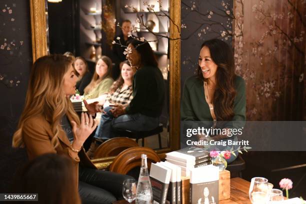 Joanna Gaines and Sam Ponder converse during Joanna Gaines's "The Stories We Tell" Book Launch Luncheon at La Mercerie Cafe on November 07, 2022 in...