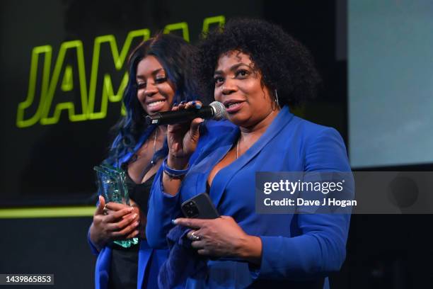 Brenda Edwards and Tanisha Edwards accept The MITS Award in memory of Jamal Edwards during the Music Industry Trust Awards 2022 at The Grosvenor...