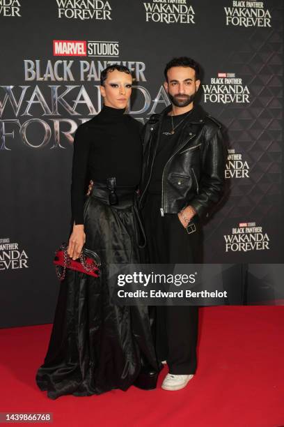 Bilal Hassani and a guest attend the "Black Panther: Wakanda Forever" Paris Screening photocall at Le Grand Rex, on November 7, 2022 in Paris, France.