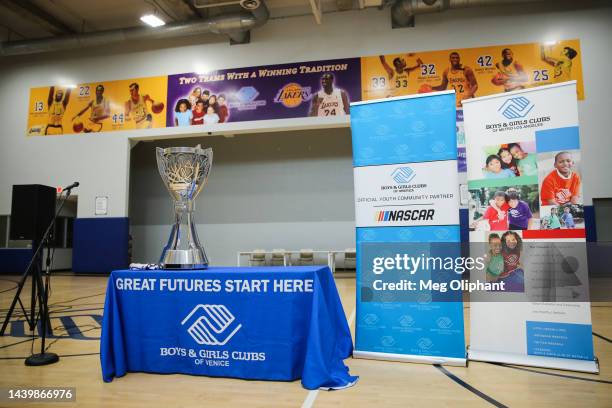 The Bill France NASCAR Cup Series Championship trophy is displayed at the Boys & Girls Club on November 07, 2022 in Los Angeles, California.