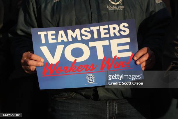 Union workers attend a rally to support democratic candidates hosted by the Teamsters on the steps of the state capital building on November 7, 2022...