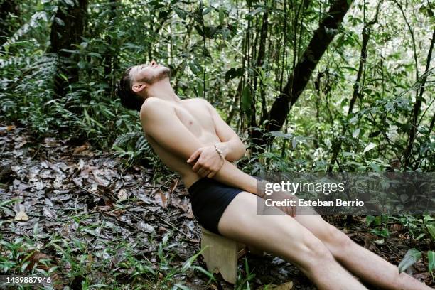 half-naked young man in the forest - half track stock pictures, royalty-free photos & images