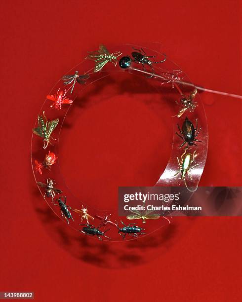 Schiaparelli insect necklace on display at the "Schiaparelli and Prada: Impossible Conversations" Costume Institute exhibition press preview at The...