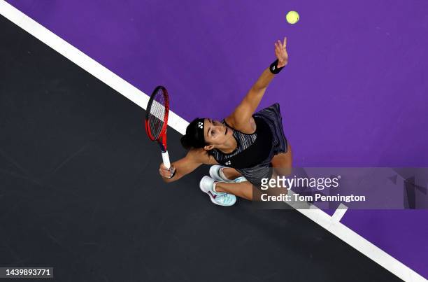 Caroline Garcia of France serves against Aryna Sabalenka of Belarus in their Women's Singles Final match during the 2022 WTA Finals, part of the...
