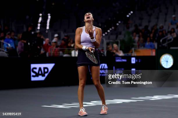 Aryna Sabalenka of Belarus reacts to a point against Caroline Garcia of France in their Women's Singles Final match during the 2022 WTA Finals, part...