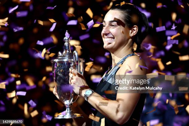 Caroline Garcia of France celebrates with the Billie Jean King Trophy after defeating Aryna Sabalenka of Belarus in their Women's Singles Final match...