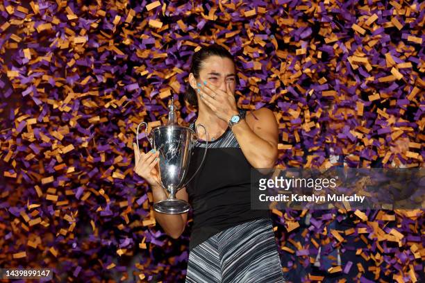 Caroline Garcia of France celebrates with the Billie Jean King Trophy after defeating Aryna Sabalenka of Belarus in their Women's Singles Final match...