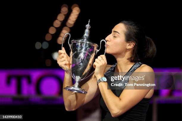 Caroline Garcia of France celebrates with the Billie Jean King Trophy after defeating Aryna Sabalenka of Belarus in their Women's Singles Final match...