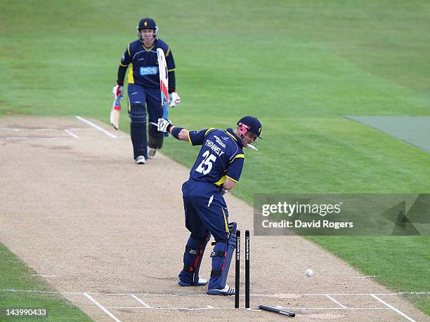 Michael Thornely of the Unicorns is bowled by Chaminda Vaas during the Clydesdale Bank Pro40 match between Northamptonshire and Unicorns at The...