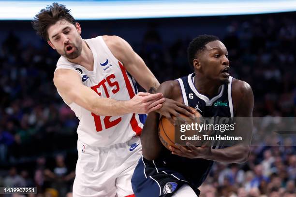 Dorian Finney-Smith of the Dallas Mavericks drives to the basket against Joe Harris of the Brooklyn Nets in the second half of the game at American...