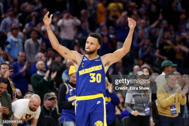 Stephen Curry of the Golden State Warriors motions to the crowd after making a three-point basket against the Sacramento Kings at Chase Center on...