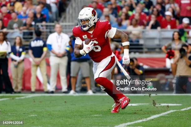 Running back James Conner of the Arizona Cardinals runs during the first half against the Seattle Seahawks at State Farm Stadium on November 06, 2022...