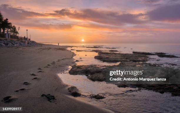 sunrise at the beach in marbella - estepona stock pictures, royalty-free photos & images