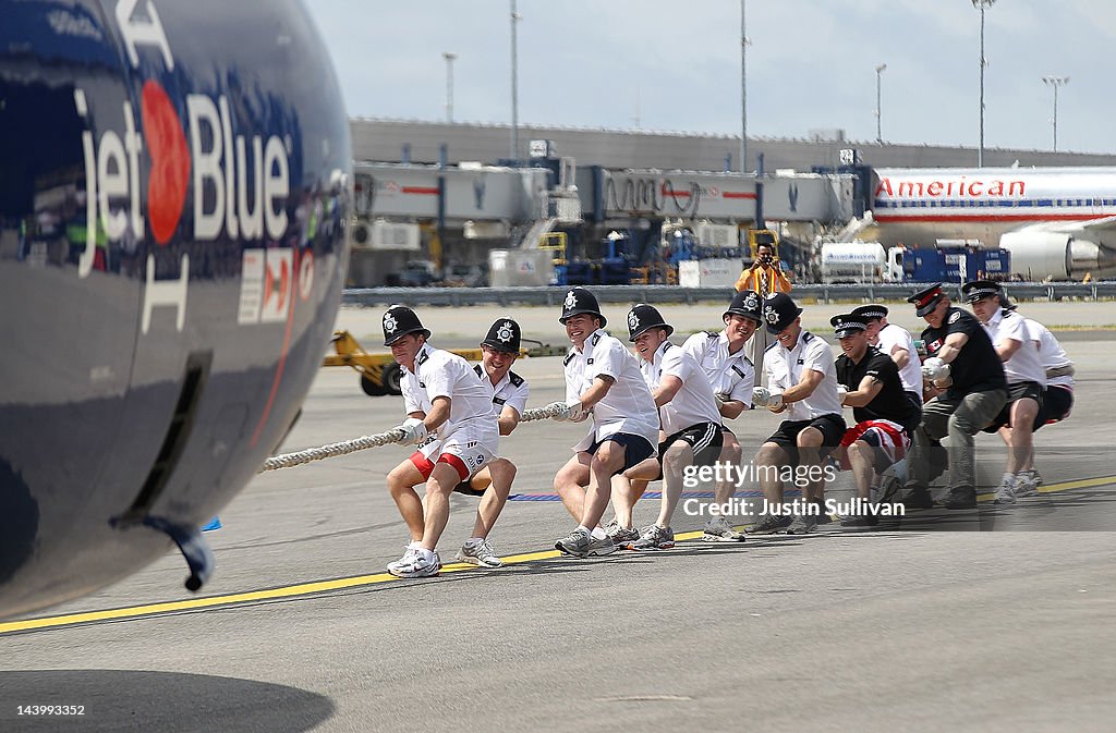 Teams Compete To Pull Passenger Jet At JFK