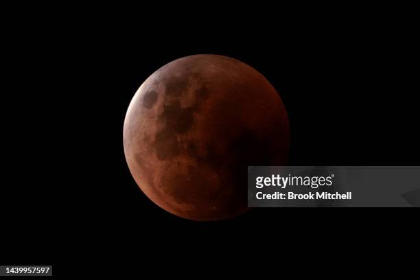 Lunar eclipse is seen in Sydney on November 08, 2022 in Sydney, Australia. Australians will experience the first visible total lunar eclipse of the...