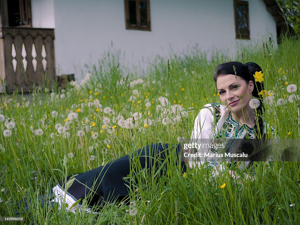 Woman lying on grass