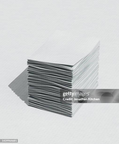 tidy stack of paper - pile of paper stockfoto's en -beelden