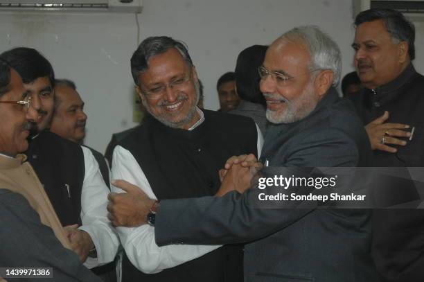 Chief Minister of Gujarat Narendra Modi meets Bhartiya Janta Party's Bihar leader Sushil Kumar Modi during a meeting in New Delhi.