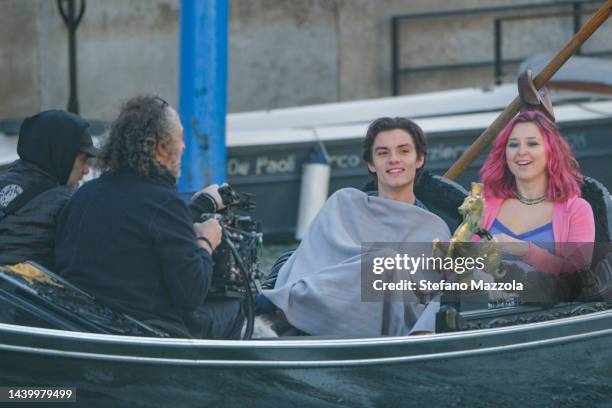 British actress Liv Hill and British actor Louis Partridge shoot a gondola scene in Venice during filming for an Apple TV production scheduled to air...