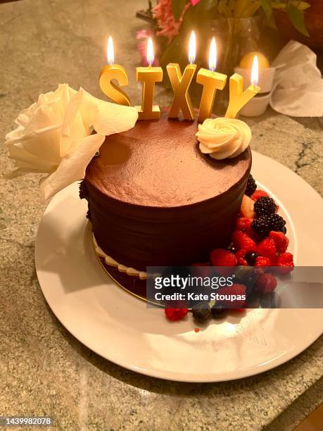 60th birthday cake - burning rose bildbanksfoton och bilder
