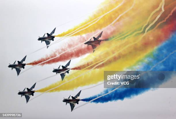 Fighter jets of Chinese air force's August 1 Aerobatic Team perform during Airshow China 2022 at Zhuhai Air Show Center on November 8, 2022 in...