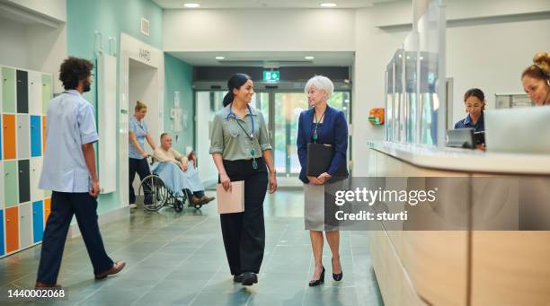 administrator with hospital ward doctor - medical sales representative stock pictures, royalty-free photos & images
