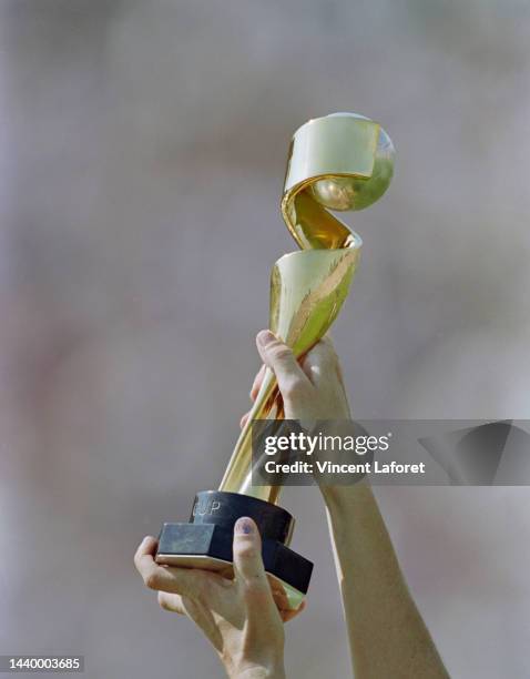 The FIFA Women's World Cup Trophy is held aloft after the Final match of the FIFA Women's World Cup between the United States women's soccer team and...
