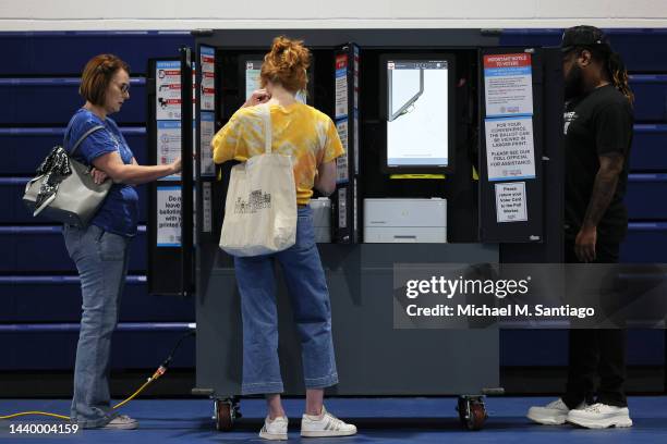 People vote during the Midterm Elections at Morningside Baptist Church Gym on November 08, 2022 in Atlanta, Georgia. After months of candidates...