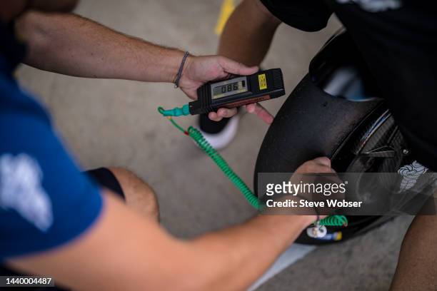 Michelin technician check the tyre temperature during the Official MotoGP Valencia Test at Ricardo Tormo Circuit on November 08, 2022 in Valencia,...